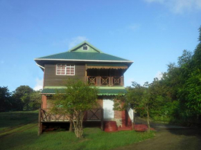 Отель Seawind Cottage Authentic St.Lucian Accommodation near Plantation Beach  Грос-Айлет